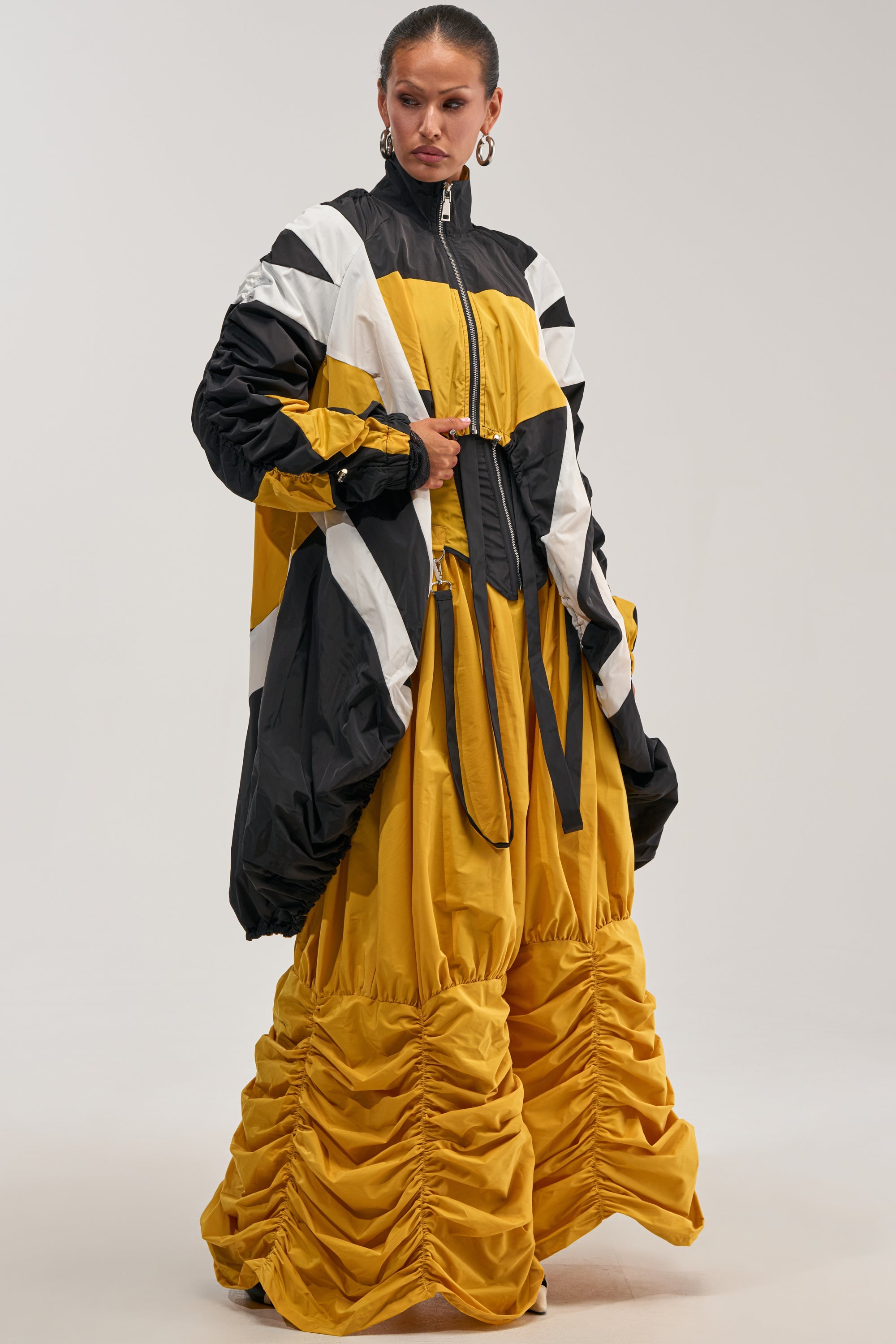 DON'T MIND ME HIGH LOW WINDBREAKER IN YELLOW