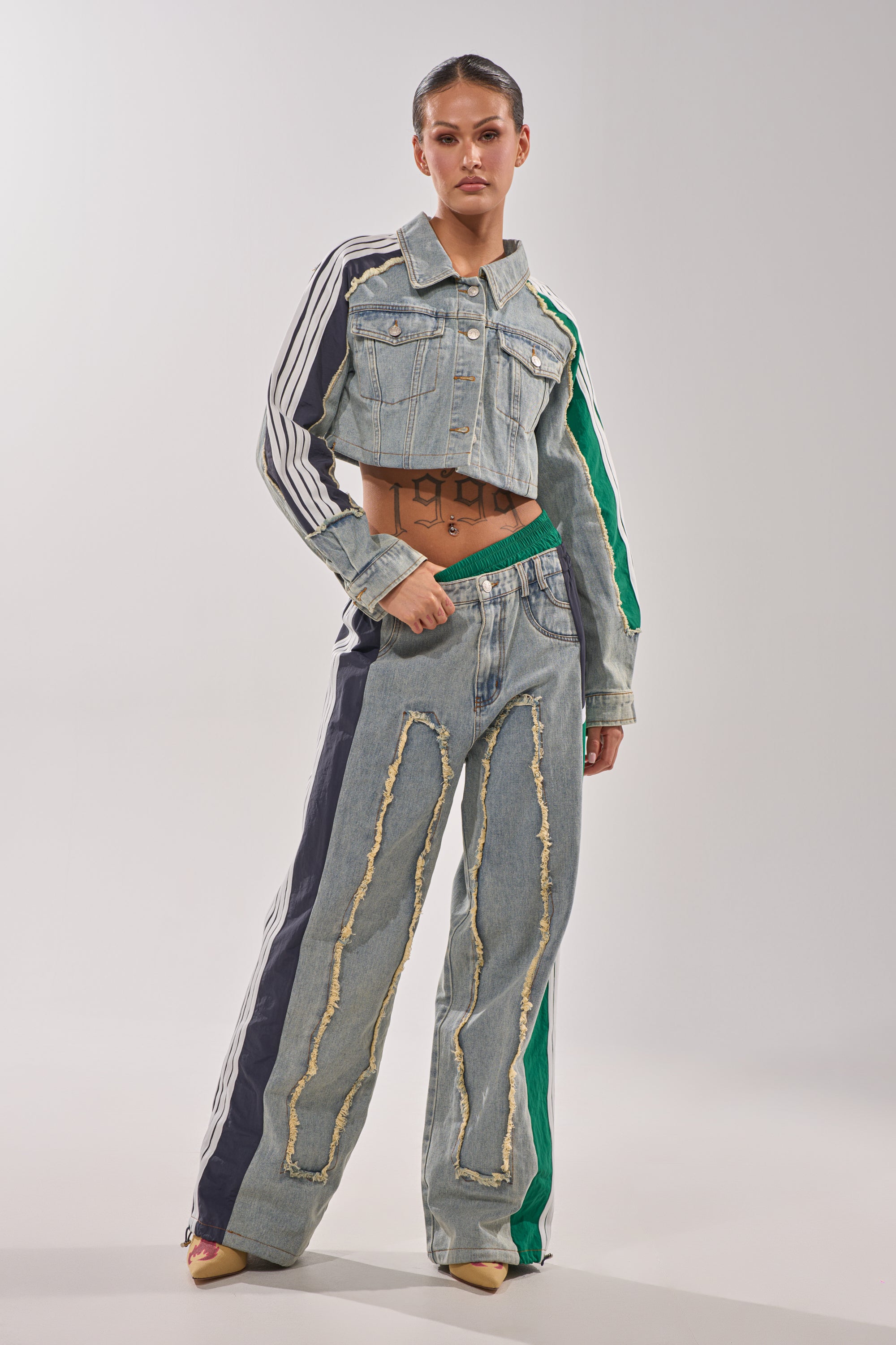 ALL AROUND THE WORLD PATCHWORK DENIM JOGGER PANT IN GREEN MULTI