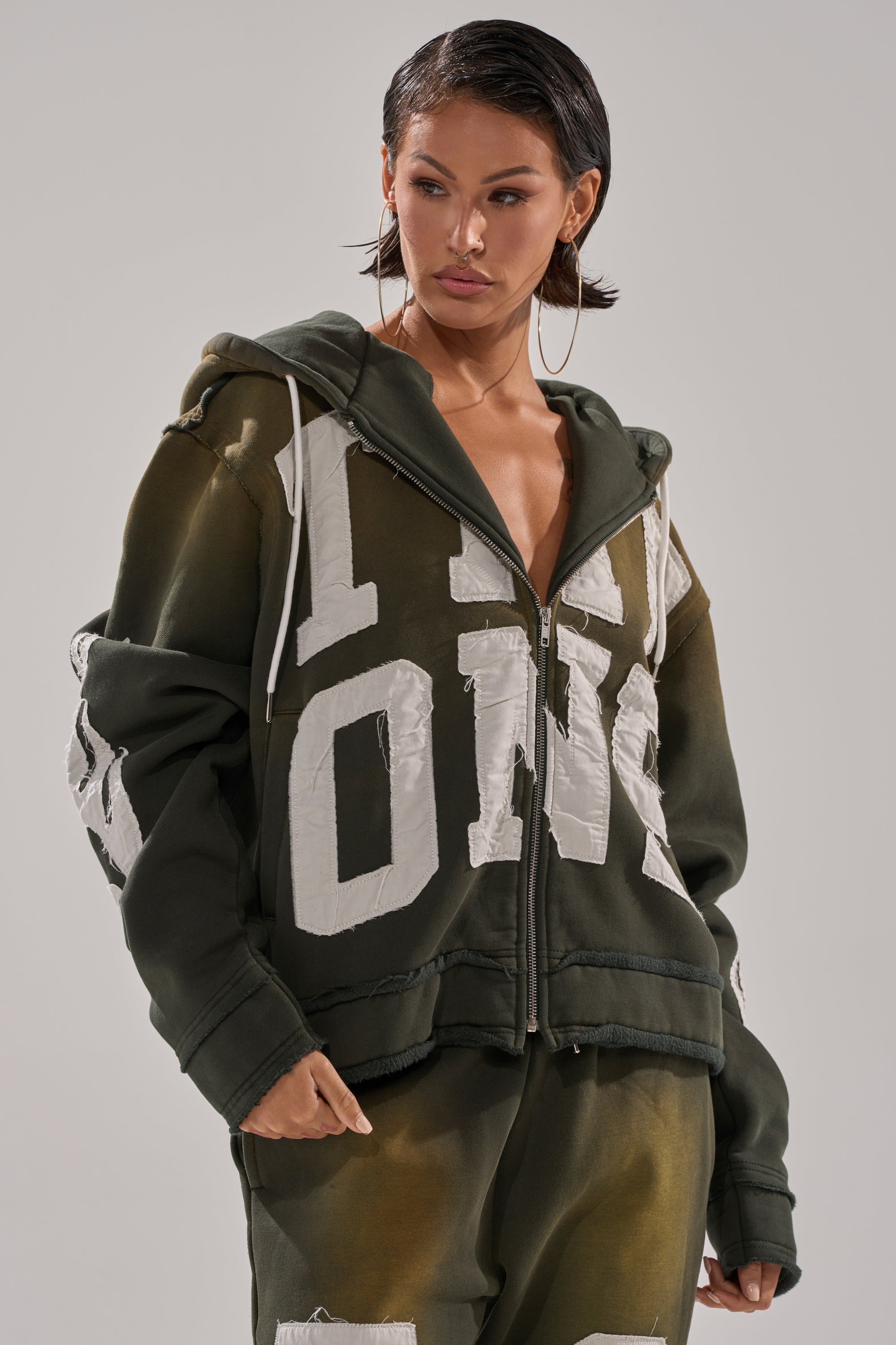 THE ONLY ONE ZIP SWEATSHIRT