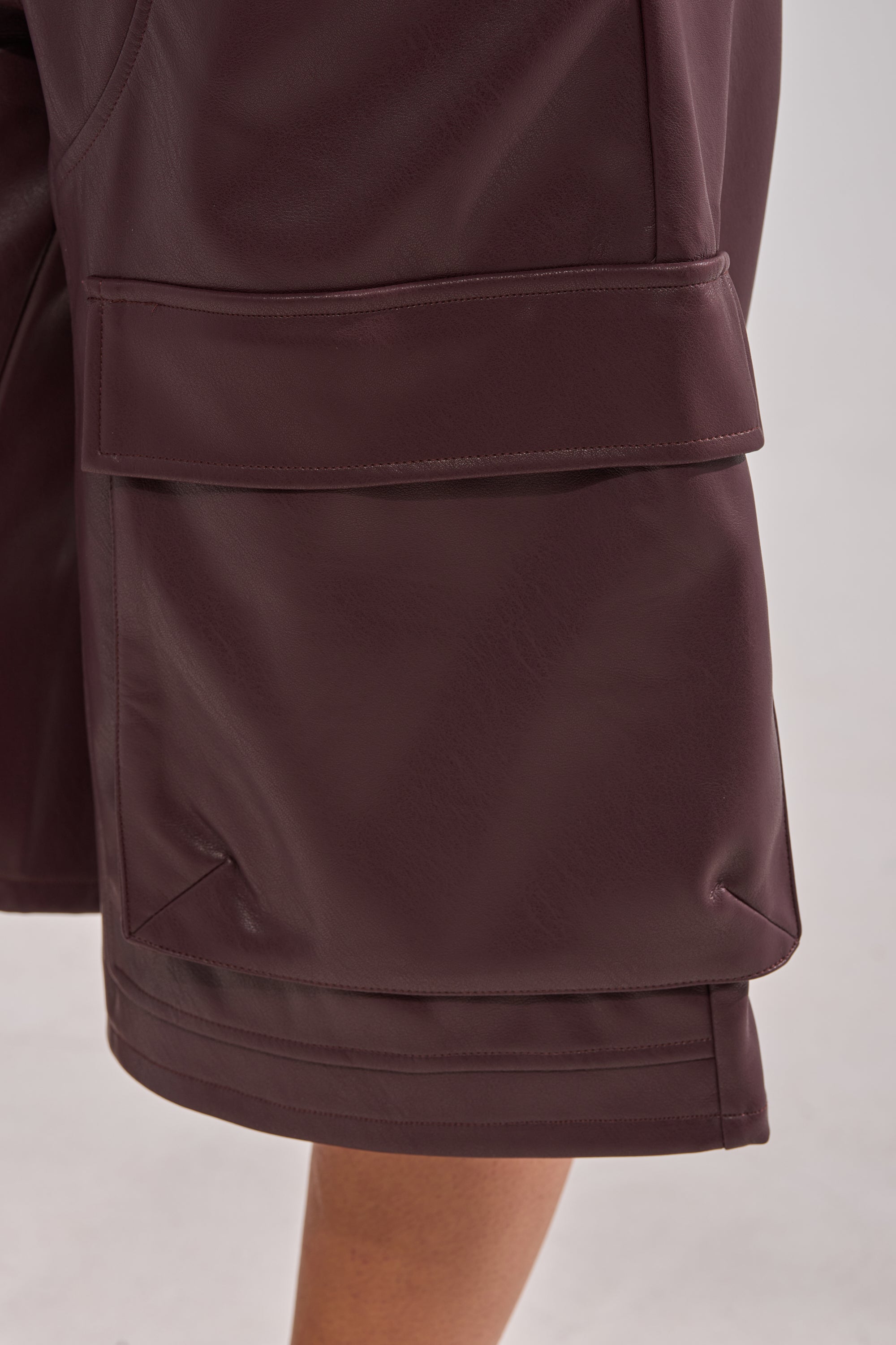 OVER DONE FAUX LEATHER BERMUDA SHORT
